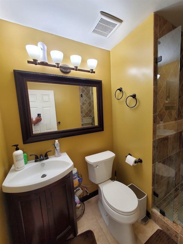 full bath featuring vanity, visible vents, a shower stall, tile patterned floors, and toilet