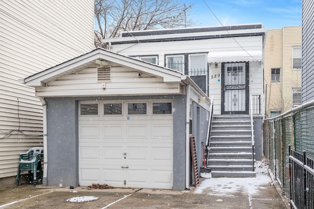 exterior space with a garage