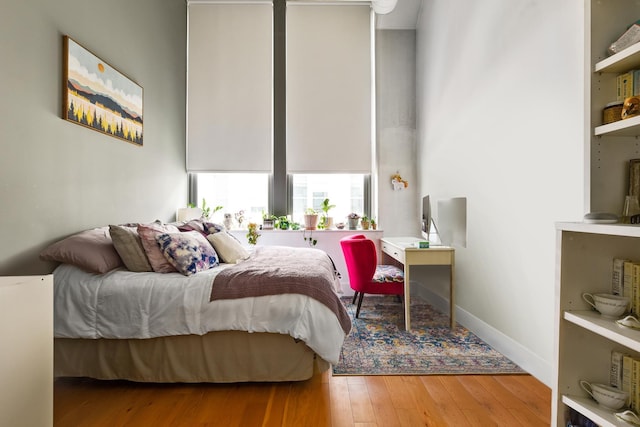 bedroom featuring hardwood / wood-style floors