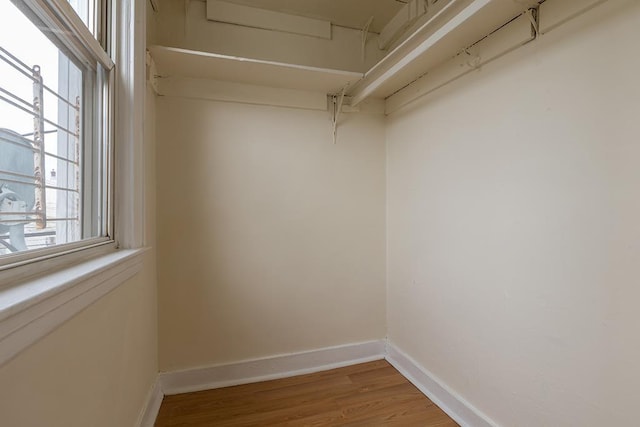 walk in closet featuring light wood-style flooring