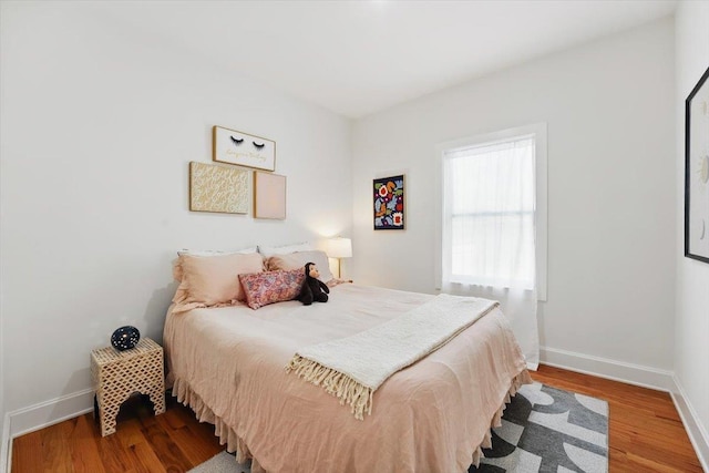 54 Logan Ave Unit 1, Jersey City, NJ 07306 - bedroom featuring baseboards and wood finished floors