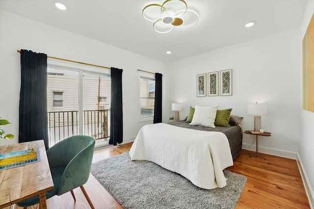 54 Logan Ave Unit 1, Jersey City, NJ 07306 - bedroom featuring access to outside, light wood-style floors, baseboards, and recessed lighting