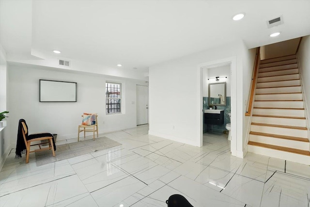 54 Logan Ave Unit 1, Jersey City, NJ 07306 - living area featuring stairs, baseboards, and recessed lighting