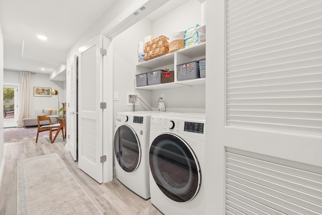 1163 Summit Ave Unit 1, Jersey City, NJ 07307 - washroom featuring light wood-type flooring, washing machine and clothes dryer, and recessed lighting