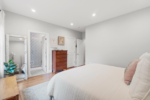 1163 Summit Ave Unit 1, Jersey City, NJ 07307 - bedroom with light wood-style floors and recessed lighting