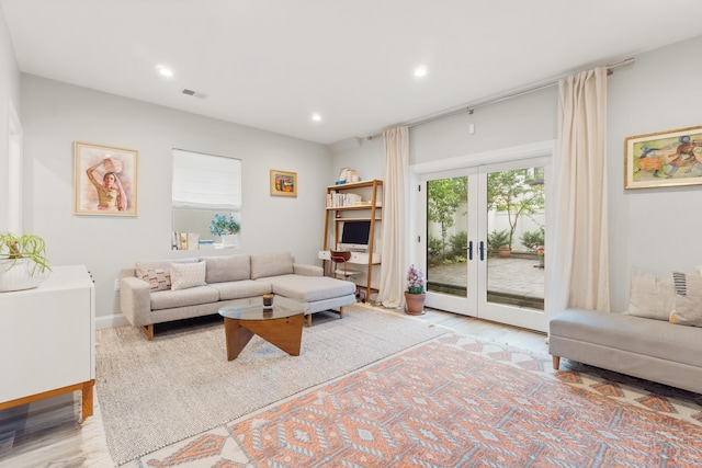 1163 Summit Ave Unit 1, Jersey City, NJ 07307 - living room featuring wood finished floors, recessed lighting, and french doors