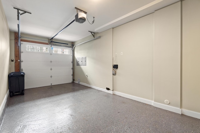 1163 Summit Ave Unit 1, Jersey City, NJ 07307 - garage featuring a garage door opener and electric panel