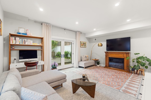 1163 Summit Ave Unit 1, Jersey City, NJ 07307 - living room with recessed lighting, a glass covered fireplace, and french doors