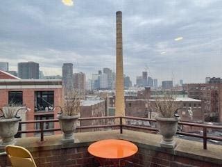 balcony featuring a view of city