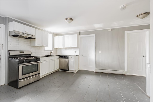 1043 Broadway, Bayonne, NJ 07002 - kitchen with appliances with stainless steel finishes, under cabinet range hood, a baseboard heating unit, a sink, and tasteful backsplash