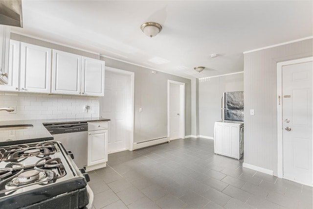 1043 Broadway, Bayonne, NJ 07002 - kitchen with dishwashing machine, dark tile patterned floors, a sink, tasteful backsplash, and ornamental molding
