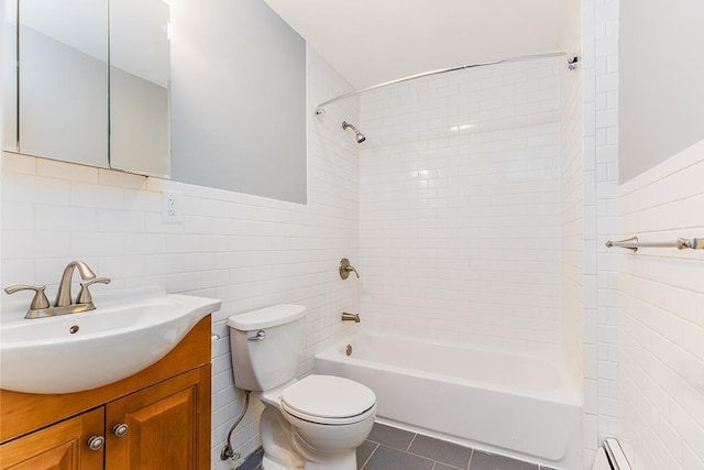 1043 Broadway, Bayonne, NJ 07002 - full bathroom featuring tile walls, bathing tub / shower combination, toilet, vanity, and tile patterned floors