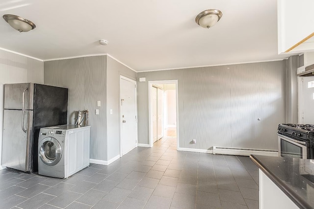 1043 Broadway, Bayonne, NJ 07002 - kitchen featuring a baseboard radiator, appliances with stainless steel finishes, washer / dryer, ornamental molding, and baseboards