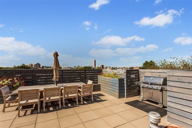 222 Montgomery St Unit 3K, Jersey City, NJ 07302 - view of patio / terrace featuring outdoor dining space and a grill