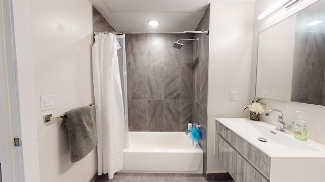 bathroom with vanity and shower / tub combo with curtain