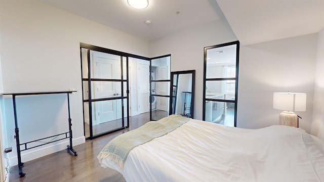 bedroom featuring hardwood / wood-style floors