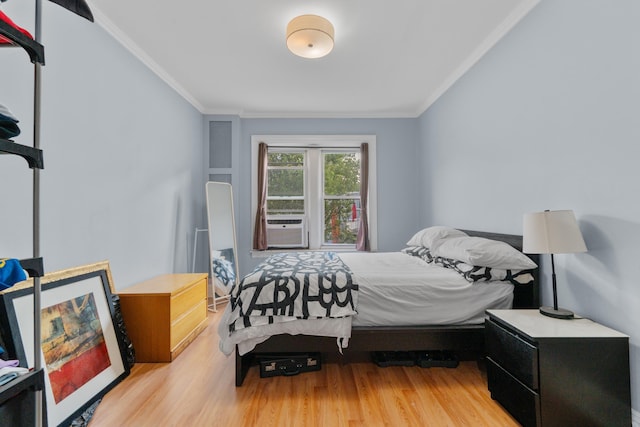 122 W 39th St Unit A4, Bayonne, NJ 07302 - bedroom with wood finished floors, ornamental molding, and cooling unit