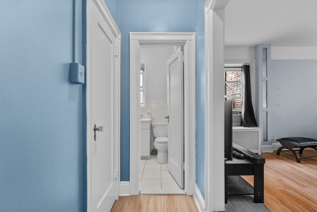 122 W 39th St Unit A4, Bayonne, NJ 07302 - corridor featuring wood finished floors and baseboards