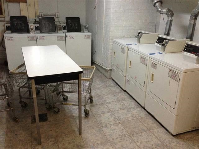 common laundry area with washing machine and clothes dryer