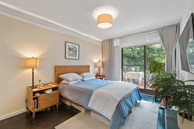 227 Montgomery St Unit 2, Jersey City, NJ 07302 - bedroom featuring wood finished floors and access to exterior
