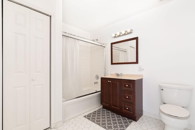 full bath with toilet, a closet, vanity, and shower / bathtub combination with curtain