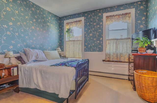 329 Adams St Unit 4, Hoboken, NJ 07030 - bedroom featuring carpet floors, wallpapered walls, and a baseboard heating unit