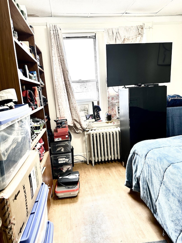 500 New York Ave, Jersey City, NJ 07087 - bedroom featuring radiator and light wood-style floors
