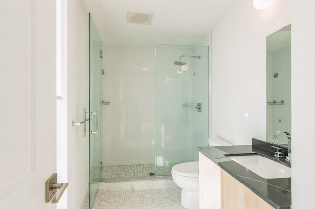 348 Baldwin Ave Unit 209, Jersey City, NJ 07306 - bathroom featuring toilet, a shower stall, tile patterned flooring, and vanity