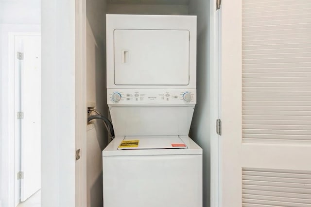 348 Baldwin Ave Unit 209, Jersey City, NJ 07306 - washroom featuring stacked washer / dryer