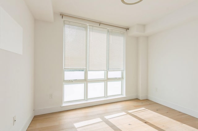 348 Baldwin Ave Unit 209, Jersey City, NJ 07306 - unfurnished room with light wood-type flooring and baseboards