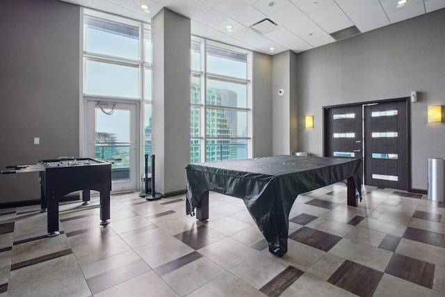 20 Newport Pkwy Unit 1006, Jersey City, NJ 07310 - game room with a high ceiling, a paneled ceiling, pool table, tile patterned floors, and baseboards