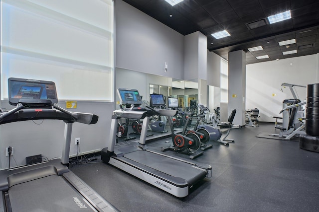 20 Newport Pkwy Unit 1006, Jersey City, NJ 07310 - workout area with a towering ceiling and a paneled ceiling