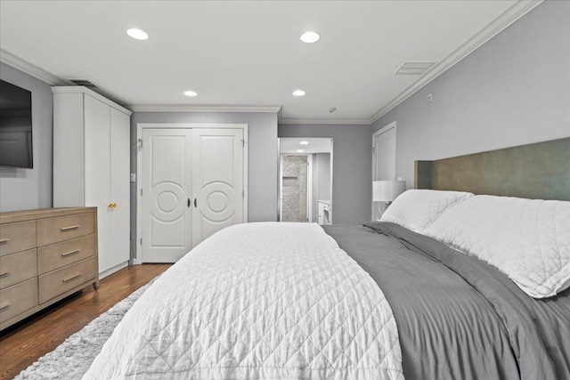 498 Teal Plz, Secaucus, NJ 07094 - bedroom with dark wood-style flooring, crown molding, and recessed lighting