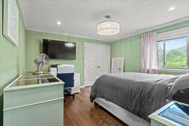 498 Teal Plz, Secaucus, NJ 07094 - bedroom with ornamental molding, dark wood finished floors, recessed lighting, and a closet