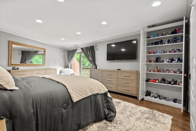 498 Teal Plz, Secaucus, NJ 07094 - bedroom with ornamental molding, wood finished floors, and recessed lighting