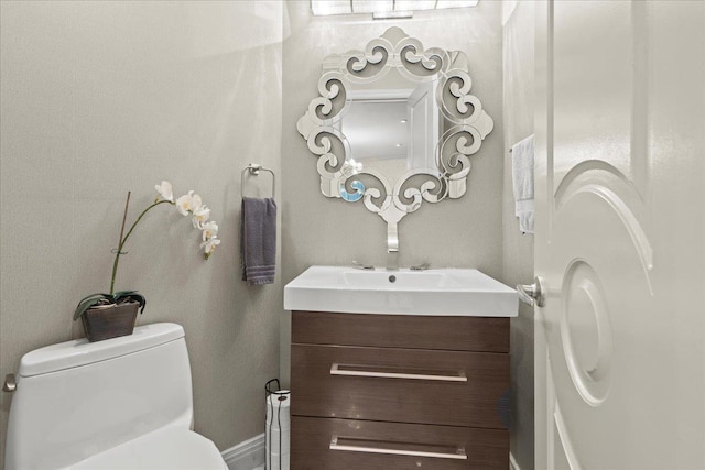 498 Teal Plz, Secaucus, NJ 07094 - half bath featuring toilet, vanity, and baseboards