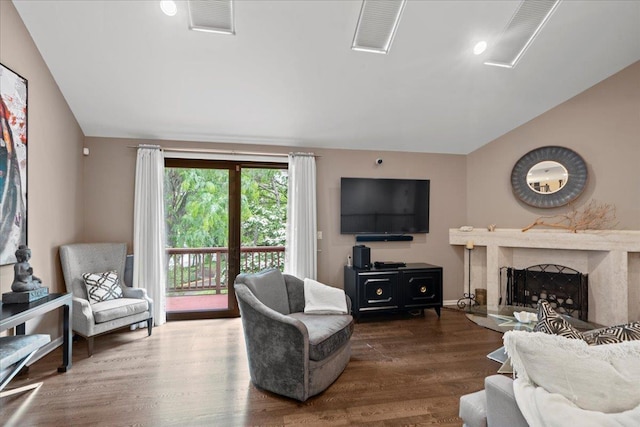 498 Teal Plz, Secaucus, NJ 07094 - living area featuring vaulted ceiling, wood finished floors, and a fireplace