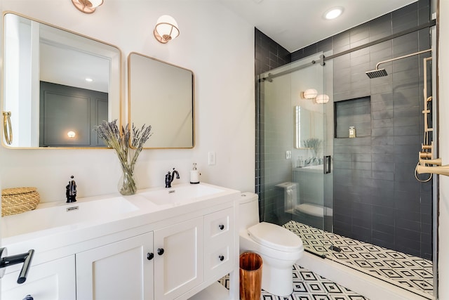 72 Lincoln St Unit 2, Jersey City, NJ 07307 - full bath with toilet, double vanity, a stall shower, and recessed lighting