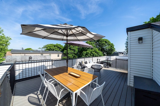 72 Lincoln St Unit 2, Jersey City, NJ 07307 - wooden terrace with outdoor dining space