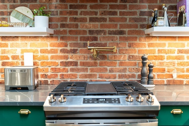 72 Lincoln St Unit 2, Jersey City, NJ 07307 - kitchen view of gas range, pot filler, and green cabinetry