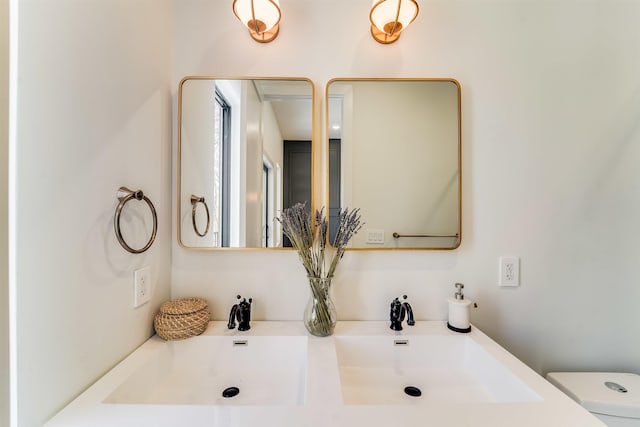72 Lincoln St Unit 2, Jersey City, NJ 07307 - bathroom featuring toilet and double vanity