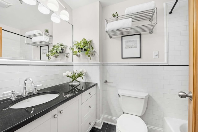 512 Jefferson St Unit 4R, Hoboken, NJ 07030 - full bathroom featuring tile walls, vanity, and tile patterned flooring