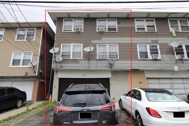 154 Fairmount Ave, Jersey City, NJ 07304 - view of property with cooling unit and stucco siding