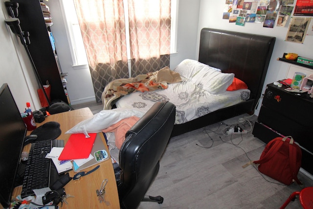 154 Fairmount Ave, Jersey City, NJ 07304 - bedroom featuring wood finished floors and a desk