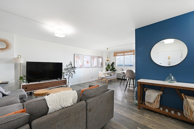 living room with dark hardwood / wood-style floors