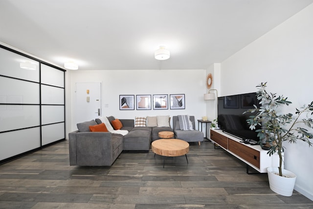 living room with dark wood-type flooring