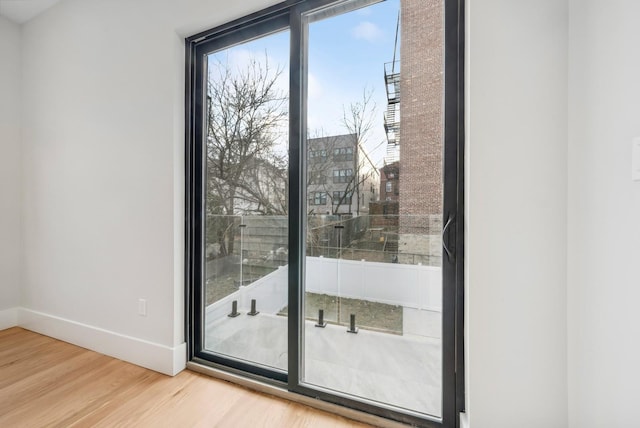 doorway featuring hardwood / wood-style flooring