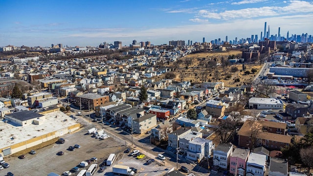 drone / aerial view featuring a city view