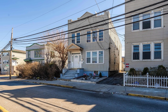 view of front of property with fence