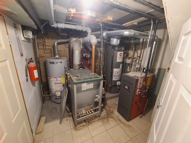 utility room featuring water heater and a heating unit